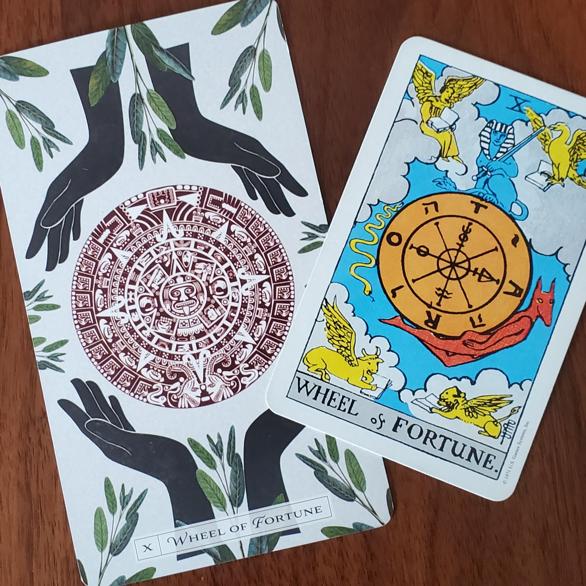 The image is of the Wheel of Fortune from the tarot.