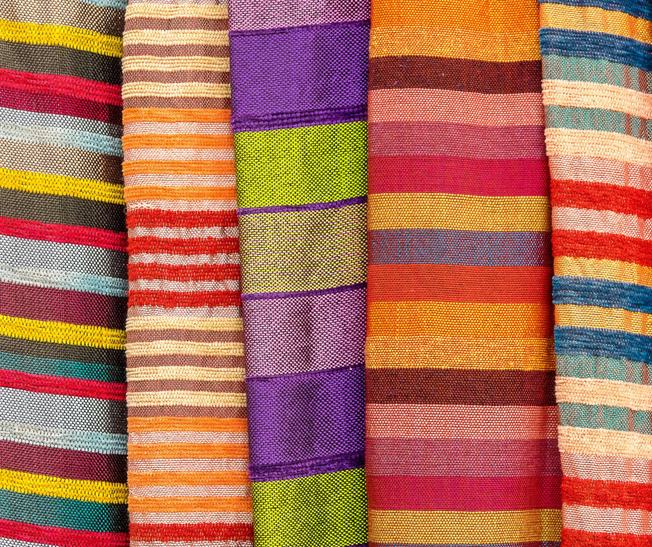 A photographic image of various colorful and striped fabrics. A photographic image of various colorful and striped fabrics.