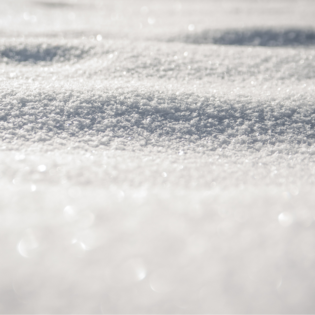 A close-up image of snow that looks like infinite flakes of snow.