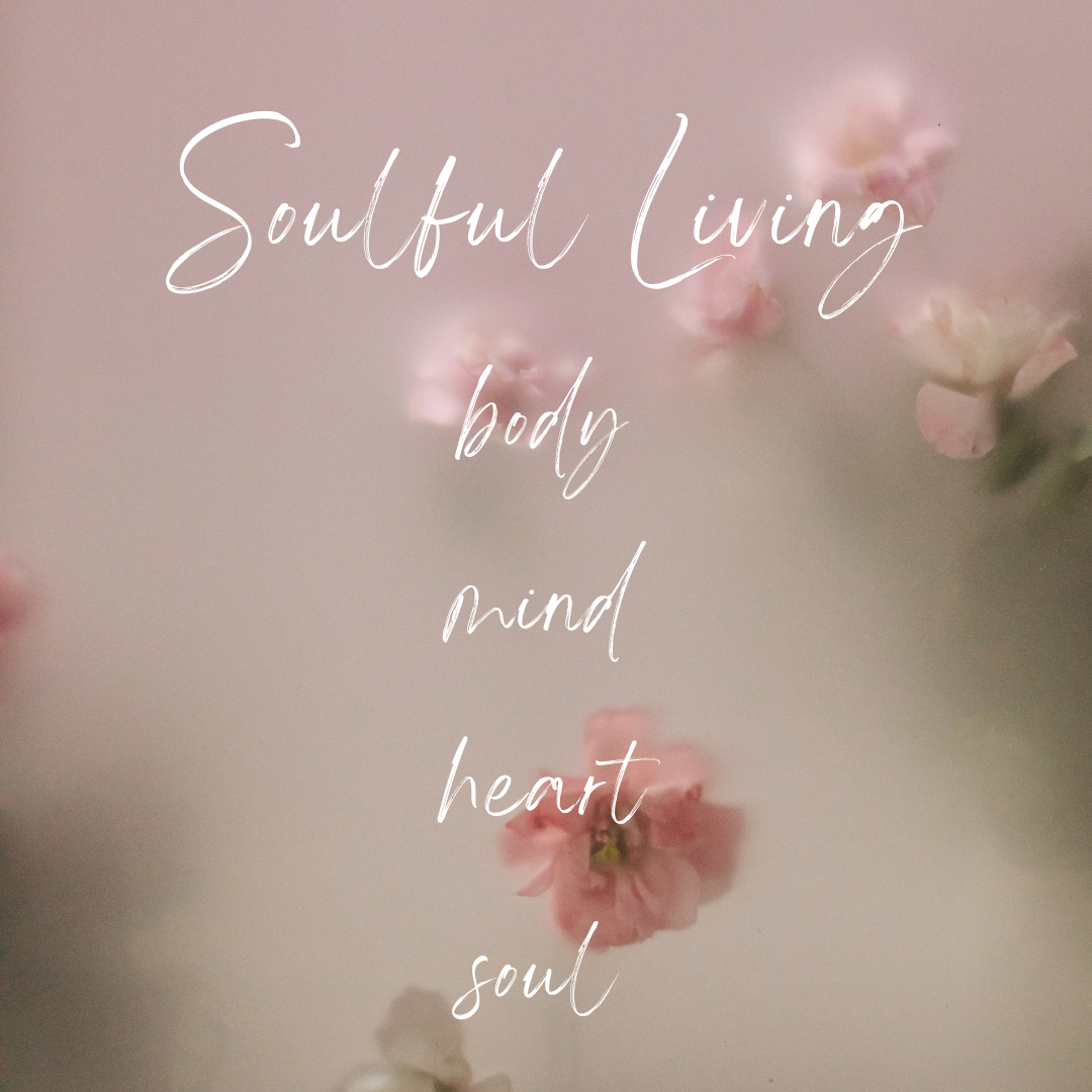 The words "soulful living, body, mind, heart, soul" on a soft floral background. The words "soulful living, body, mind, heart, soul" on a soft floral background.